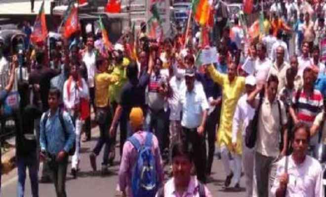 शिक्षा मंत्री के इस्तीफे को ले भाजपा ने निकाला आक्रोश मार्च